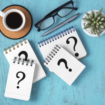 question marks on little notepads