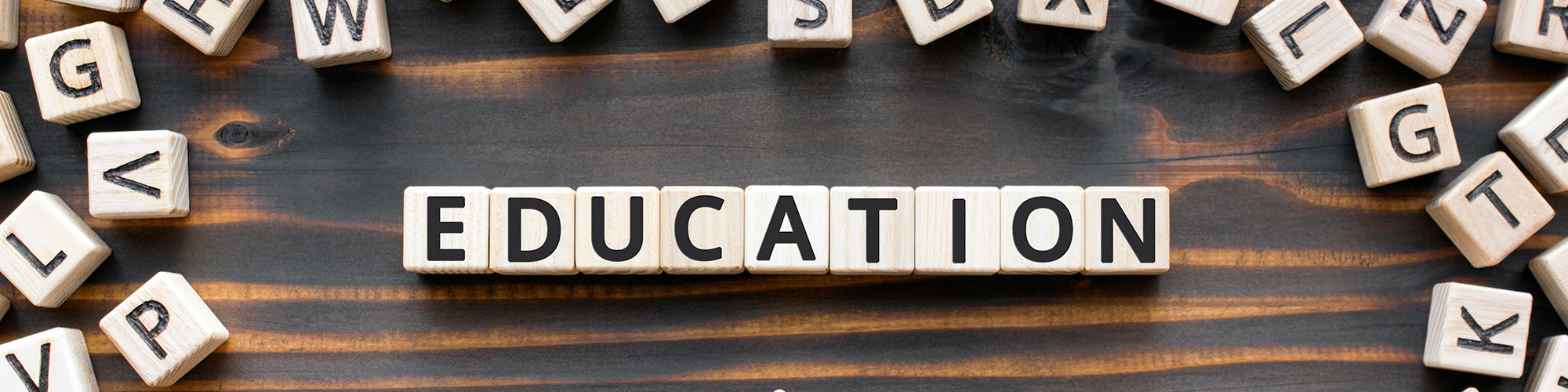 scrabble tiles that spell education