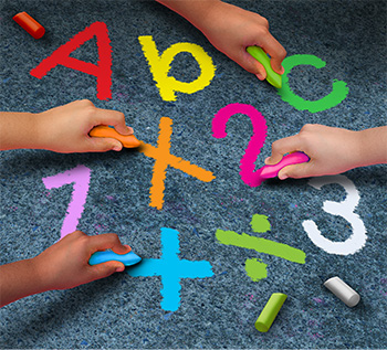 Students writing with chalk