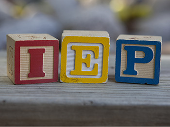 wooden blocks that spell IEP