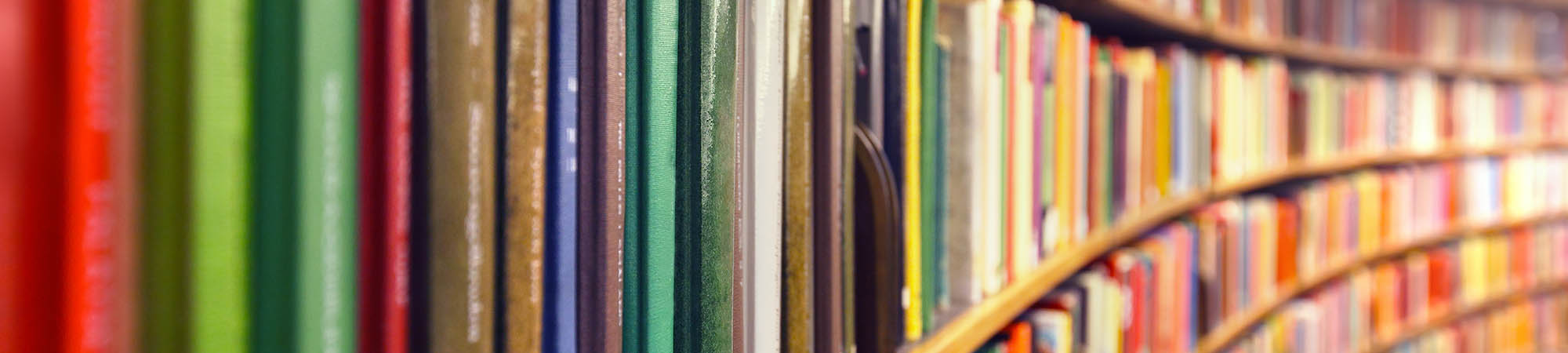 Rows of colorful books in a library