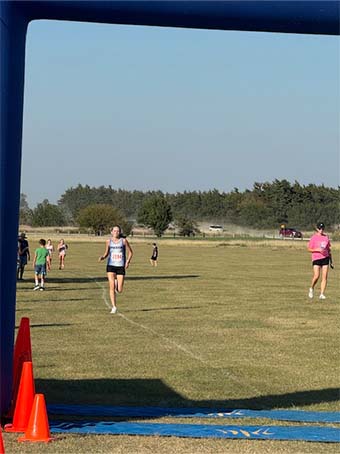 Student running for finish line