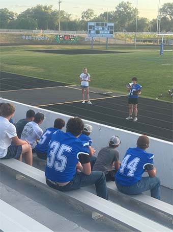 Football team on bleachers