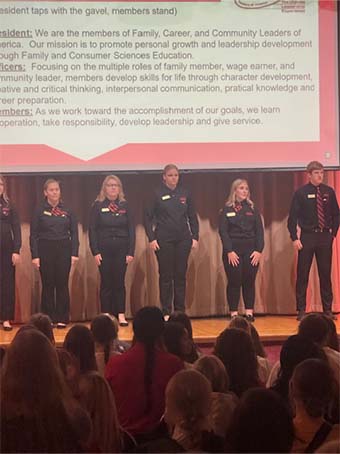 Students on stage for awards