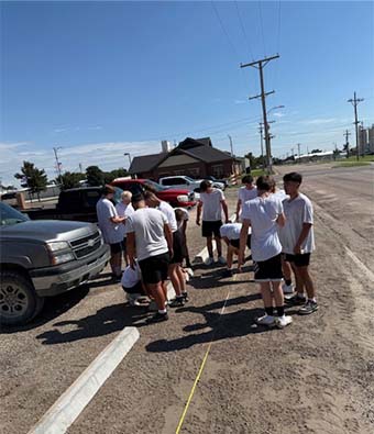 students in a parking lot