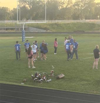 students on football field