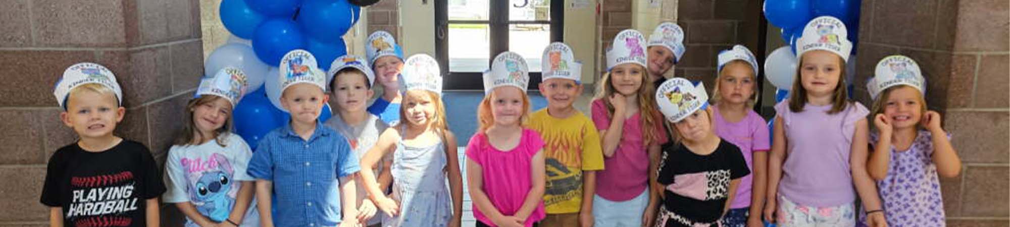 Preschool students with hats on