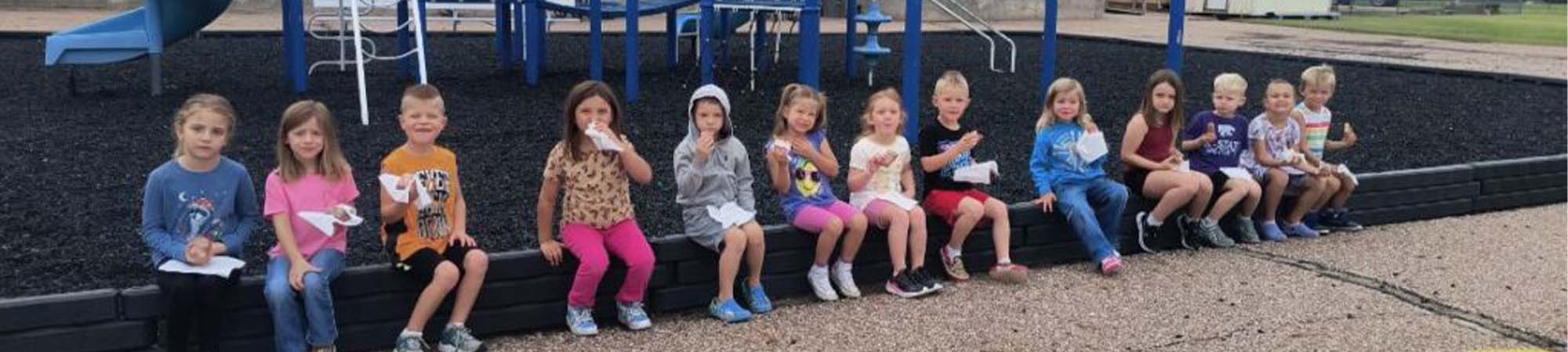 Preschool students at a playground