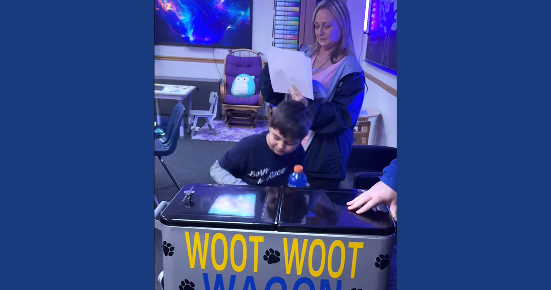 Woot Woot Wagon team visiting a classroom