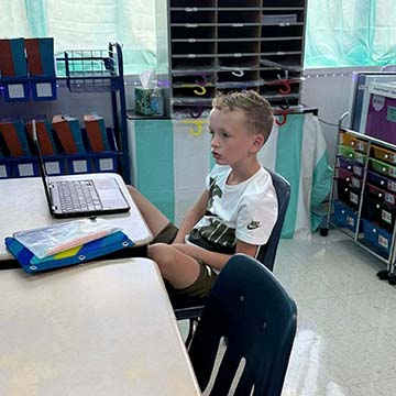 Student working on a laptop