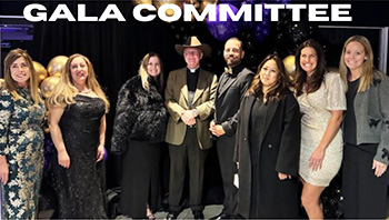 Staff members golf team Gala Committee members posing for a picture