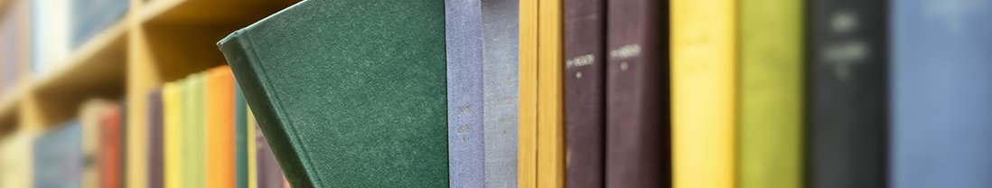Assorted books on a book shelf