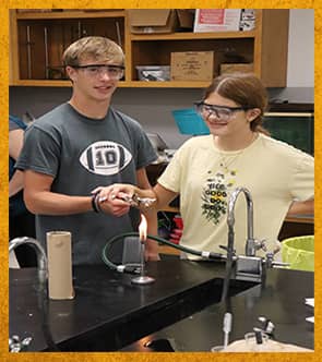 Two students working in a classroom lab