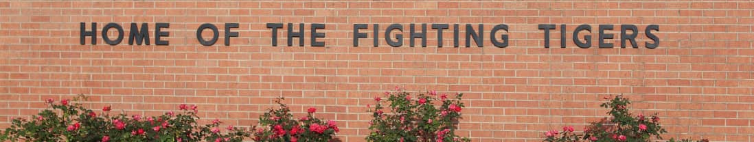 Home of the Fighting Tigers on side of building
