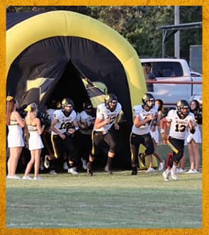 Football team running out on to the field