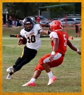Two football players on field
