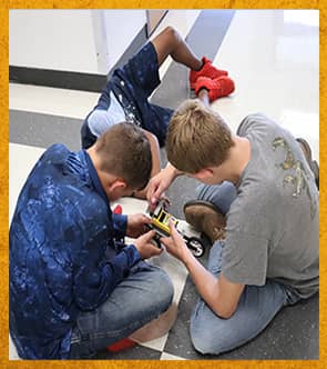 Students working on a project together