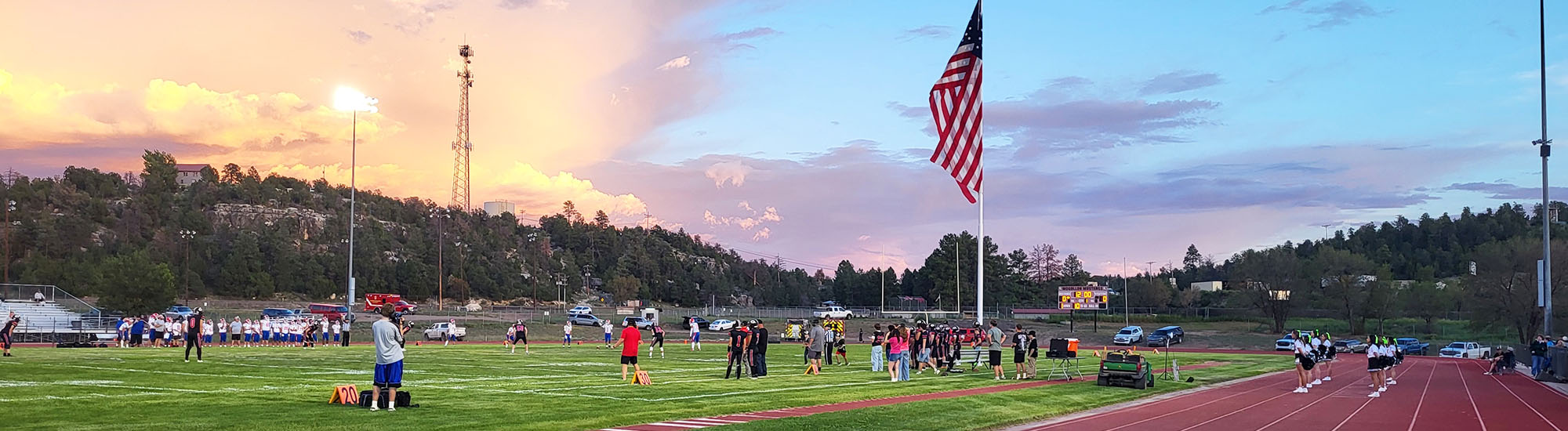 Beautiful view of football field with the USA flag
