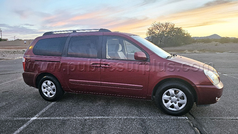 Maroon 2008 Kia Mini Van on sale via Public Surplus