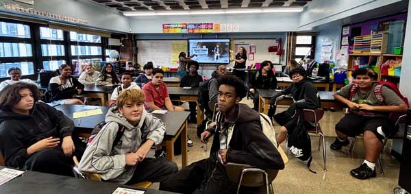 Group photo of students in a classroom