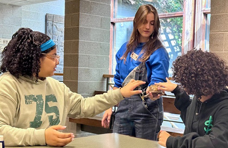 Three students working together