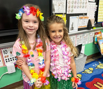 Two happy elementary school girls