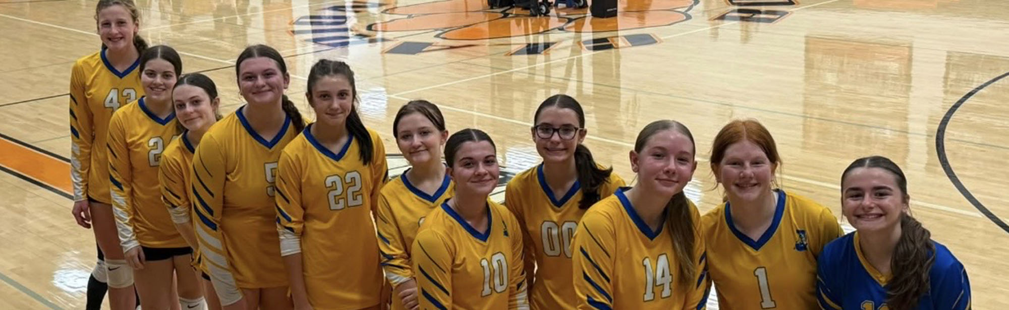 Volleyball team 2026 smiling for the camera