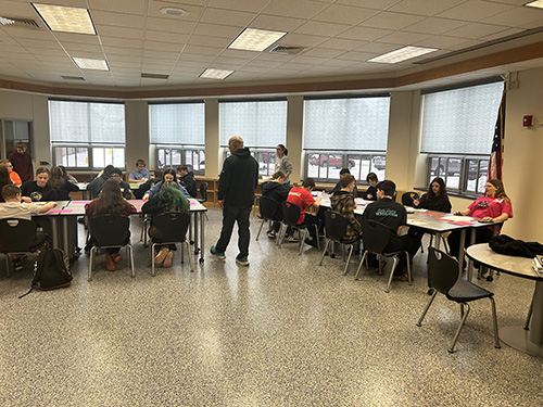 Mrs. Huff’s class learning about synchronous flow of product and the manufacturing process