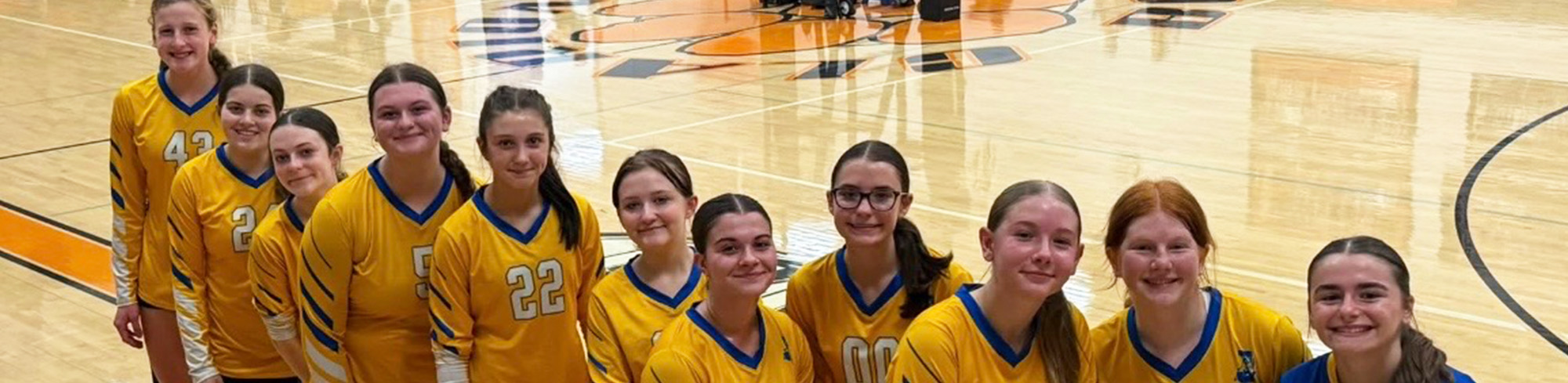 Volleyball team 2026 smiling for the camera