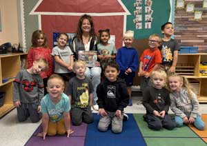 Group picture of student with the author
