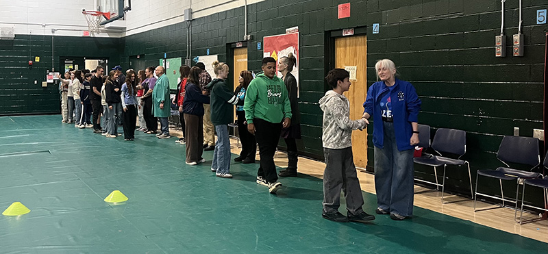 Group of students in a line in the gym