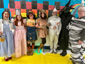 Staff members dressed up as characters from The Wizard of Oz