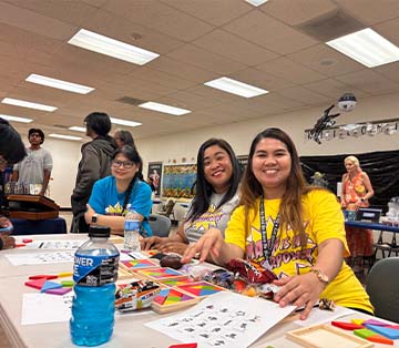 Staff members smiling