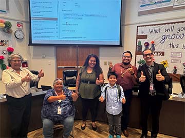 student of the month with staff