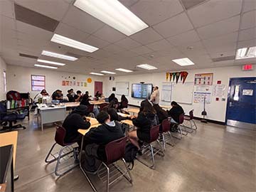 Students working at tables
