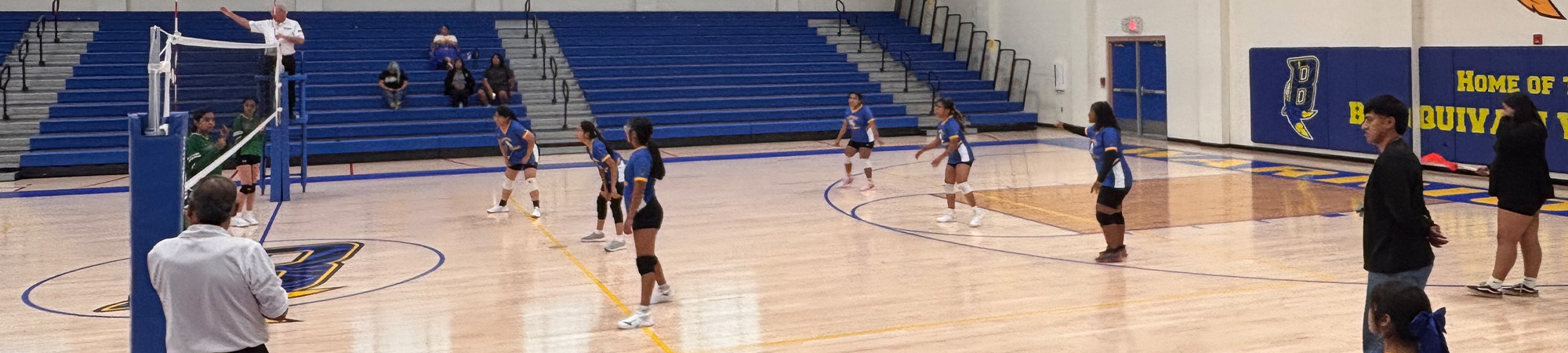 Students playing volleyball