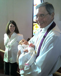 Pastor Rupp with child