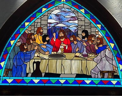 stained glass depiction of the last supper