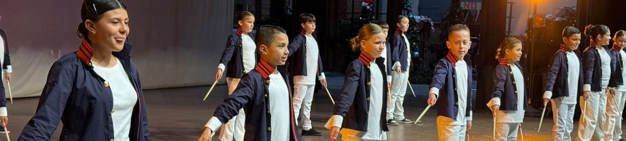 Students performing on stage