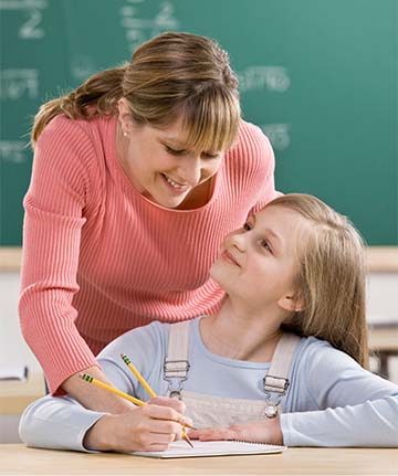 Student and teacher working together