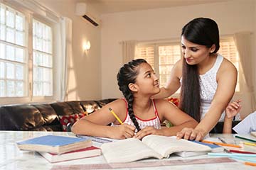 Parent helping their student with homework