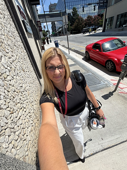 Layla Brewer walking outside