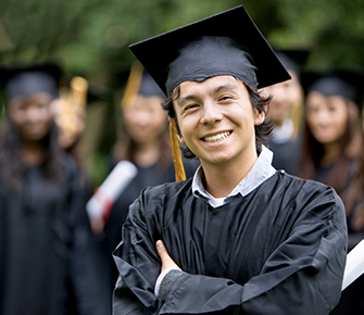Happy male graduate smiling for the camera