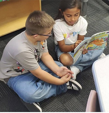 Students reading together