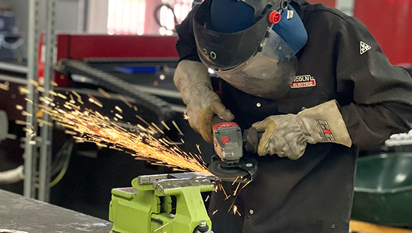 Welding student working on a project