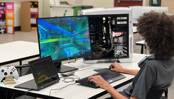 student playing computer games