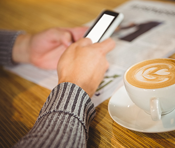 Parent looking up school information on their mobile phone