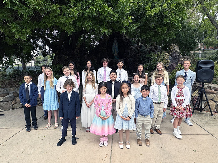 Group of students outside honoring May Crowning