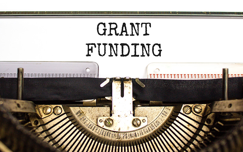 Grant Funding typed out from a typewriter