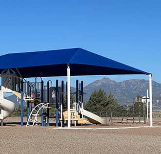 school playground with mountains in the background